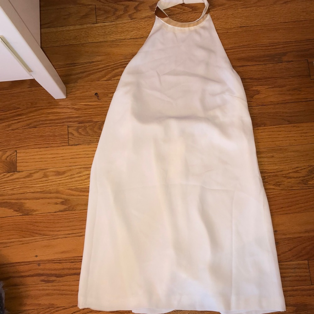 White backless shift dress.